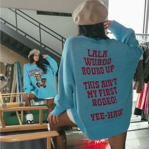 Dressed in LALA Blue Cowboys Cry Sweater
